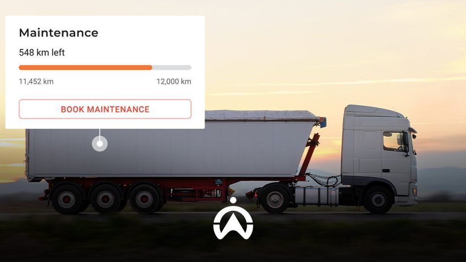 A white truck drives on a road with a maintenance alert showing 548 km left until service, alongside a progress bar and booking option.